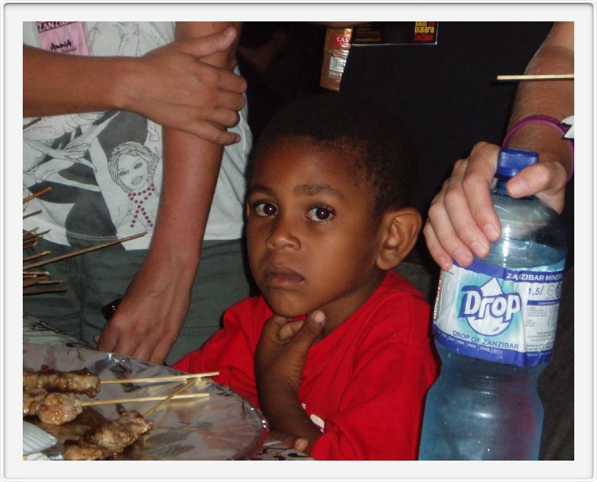 Young customer at the food stalls